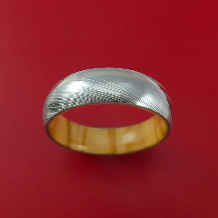 Damascus Steel Ring with 14K White Gold Inlay and Interior Hardwood Sleeve Custom Made Band Lashbrook Rings Damascus Steel Ring with 14K White Gold Inlay and Interior Hardwood Sleeve Custom Made Band Lashbrook Rings