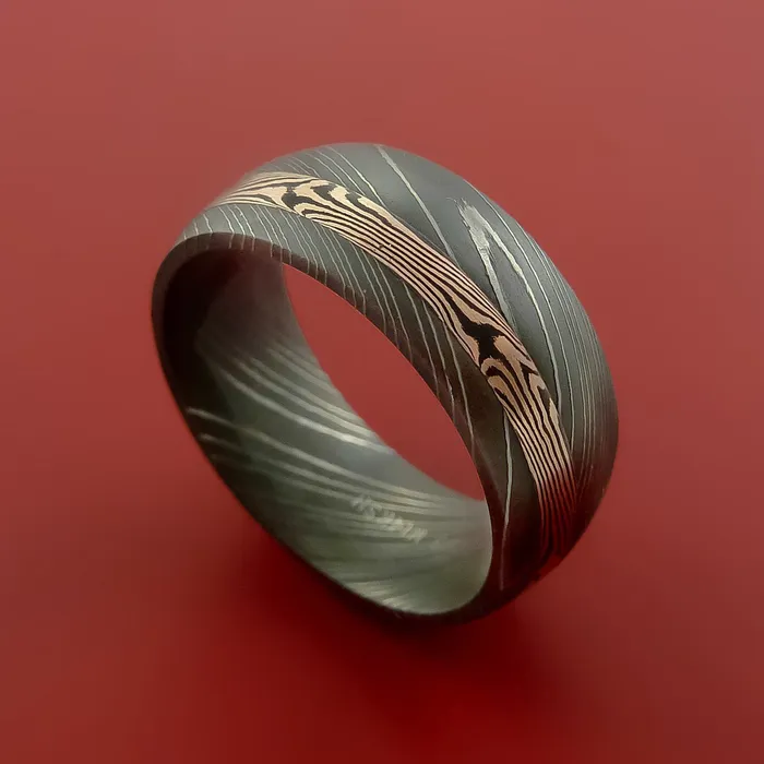 Rings Lashbrook Damascus Steel Ring with 14k Rose Gold Mokume Shakudo Inlay Custom Made Band Rings Lashbrook Damascus Steel Ring with 14k Rose Gold Mokume Shakudo Inlay Custom Made Band