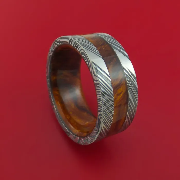 Wide Kuro Damascus Steel Ring with Hardwood Inlay and Interior Hardwood Sleeve Custom Made Band Lashbrook Rings Wide Kuro Damascus Steel Ring with Hardwood Inlay and Interior Hardwood Sleeve Custom Made Band Lashbrook Rings