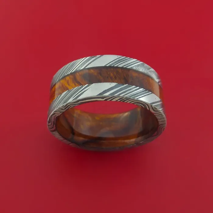 Wide Kuro Damascus Steel Ring with Hardwood Inlay and Interior Hardwood Sleeve Custom Made Band Lashbrook Rings Wide Kuro Damascus Steel Ring with Hardwood Inlay and Interior Hardwood Sleeve Custom Made Band Lashbrook Rings