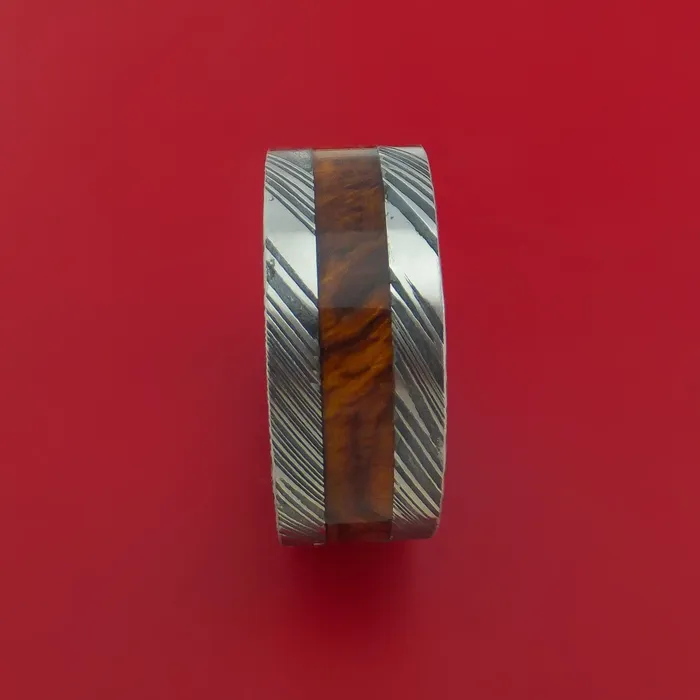 Wide Kuro Damascus Steel Ring with Hardwood Inlay and Interior Hardwood Sleeve Custom Made Band Lashbrook Rings Wide Kuro Damascus Steel Ring with Hardwood Inlay and Interior Hardwood Sleeve Custom Made Band Lashbrook Rings