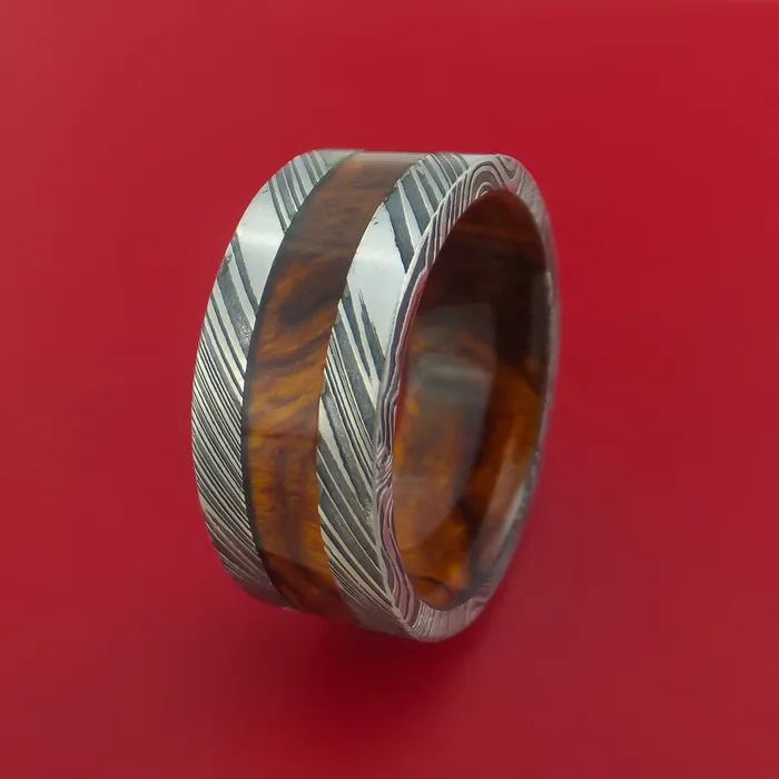 Wide Kuro Damascus Steel Ring with Hardwood Inlay and Interior Hardwood Sleeve Custom Made Band Lashbrook Rings Wide Kuro Damascus Steel Ring with Hardwood Inlay and Interior Hardwood Sleeve Custom Made Band Lashbrook Rings